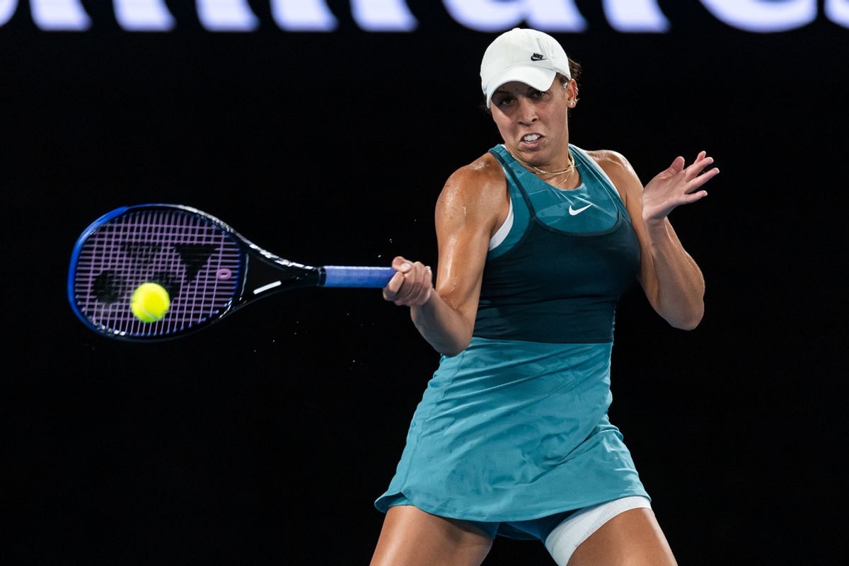 Jan 24, 2025; Melbourne, Victoria, Australia; Madison Keys of United States of America hits a forehand during her match against Iga Swiatek of Poland in the semifinals of the women's singles at the 2025 Australian Open at Melbourne Park. Mandatory Credit: Mike Frey-Imagn Images