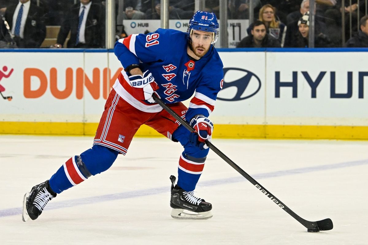 Jan 23, 2025; New York, New York, USA;  New York Rangers right wing Reilly Smith (91) looks for a pass against the Philadelphia Flyers during the first period at Madison Square Garden. Mandatory Credit: Dennis Schneidler-Imagn Images