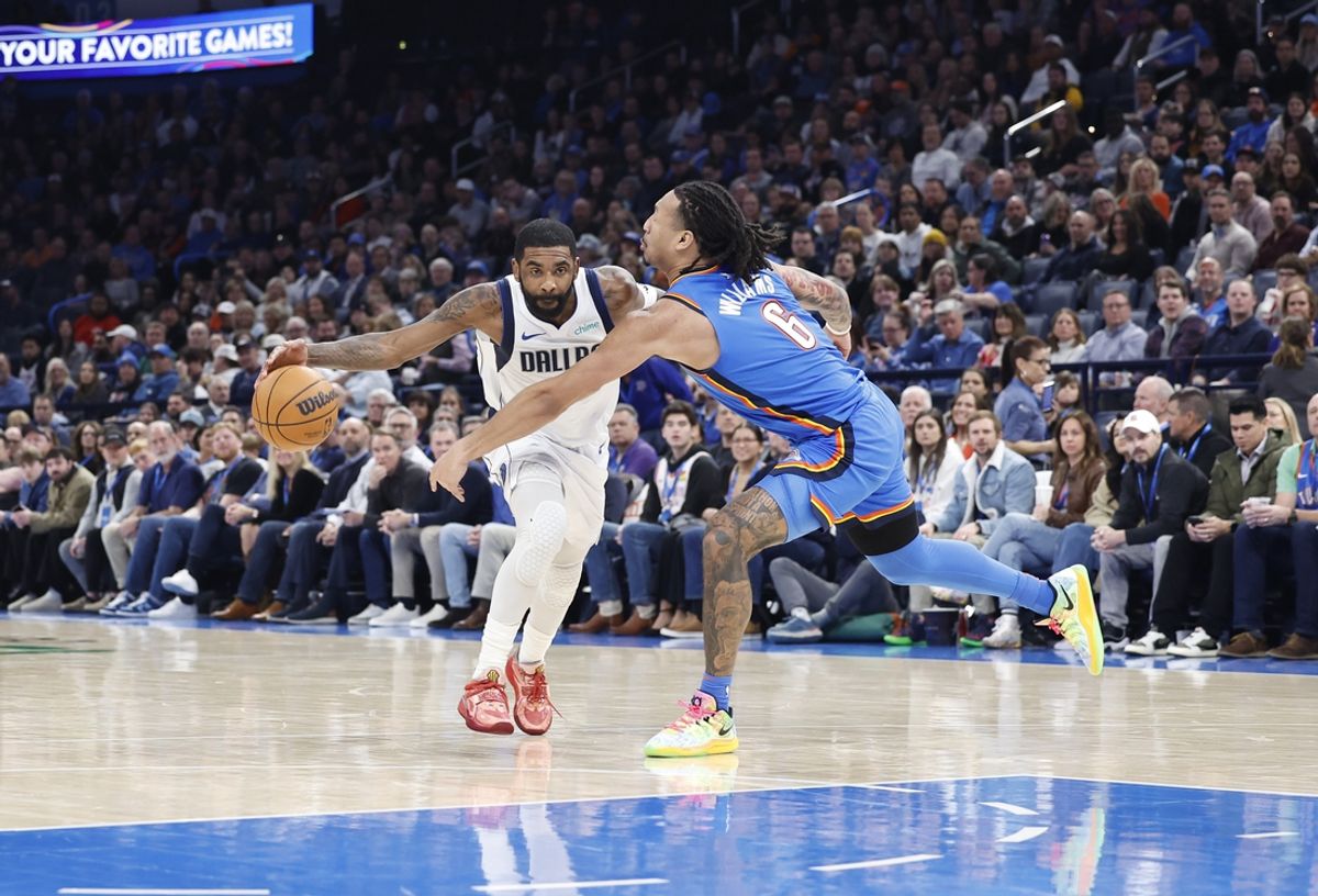 Jan 23, 2025; Oklahoma City, Oklahoma, USA; Dallas Mavericks guard Kyrie Irving (11) is defended by Oklahoma City Thunder forward Jaylin Williams (6) on a drive during the second quarter at Paycom Center. Mandatory Credit: Alonzo Adams-Imagn Images