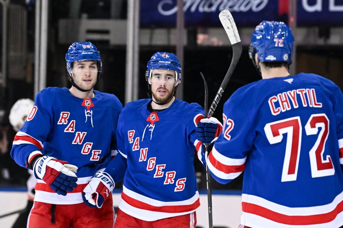 Jan 23, 2025; New York, New York, USA; New York Rangers left wing Will Cuylle (50) and New York Rangers center Filip Chytil (72) celebrate the goal by New York Rangers right wing Reilly Smith (91) against the Philadelphia Flyers during the third period at Madison Square Garden. Mandatory Credit: Dennis Schneidler-Imagn Images