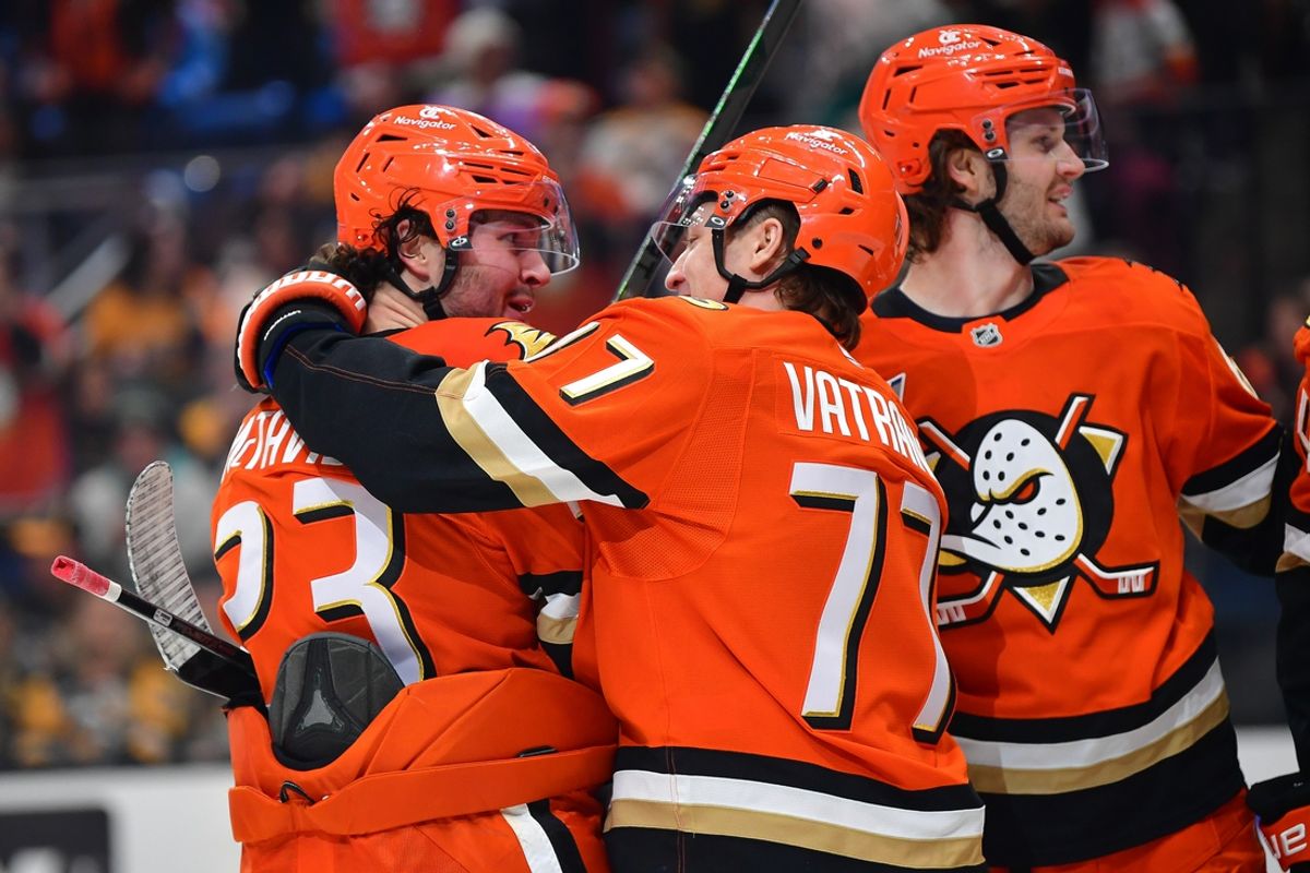 Jan 23, 2025; Anaheim, California, USA; Anaheim Ducks center Mason McTavish (23) celebrates his goal scored against the Pittsburgh Penguins with right wing Frank Vatrano (77) during the first period at Honda Center. Mandatory Credit: Gary A. Vasquez-Imagn Images