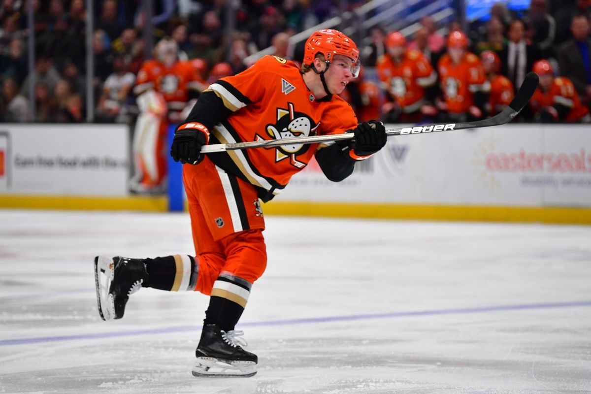 Jan 23, 2025; Anaheim, California, USA; Anaheim Ducks defenseman Jackson LaCombe (2) shoots on goal against the Pittsburgh Penguins during the third period at Honda Center. Mandatory Credit: Gary A. Vasquez-Imagn Images
