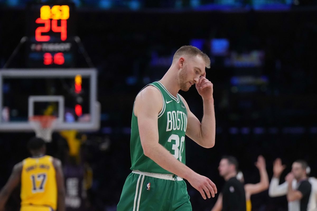 Jan 23, 2025; Los Angeles, California, USA; Boston Celtics forward Sam Hauser (30) reacts in the second half against the Los Angeles Lakers at the Crypto.com Arena. Mandatory Credit: Kirby Lee-Imagn Images