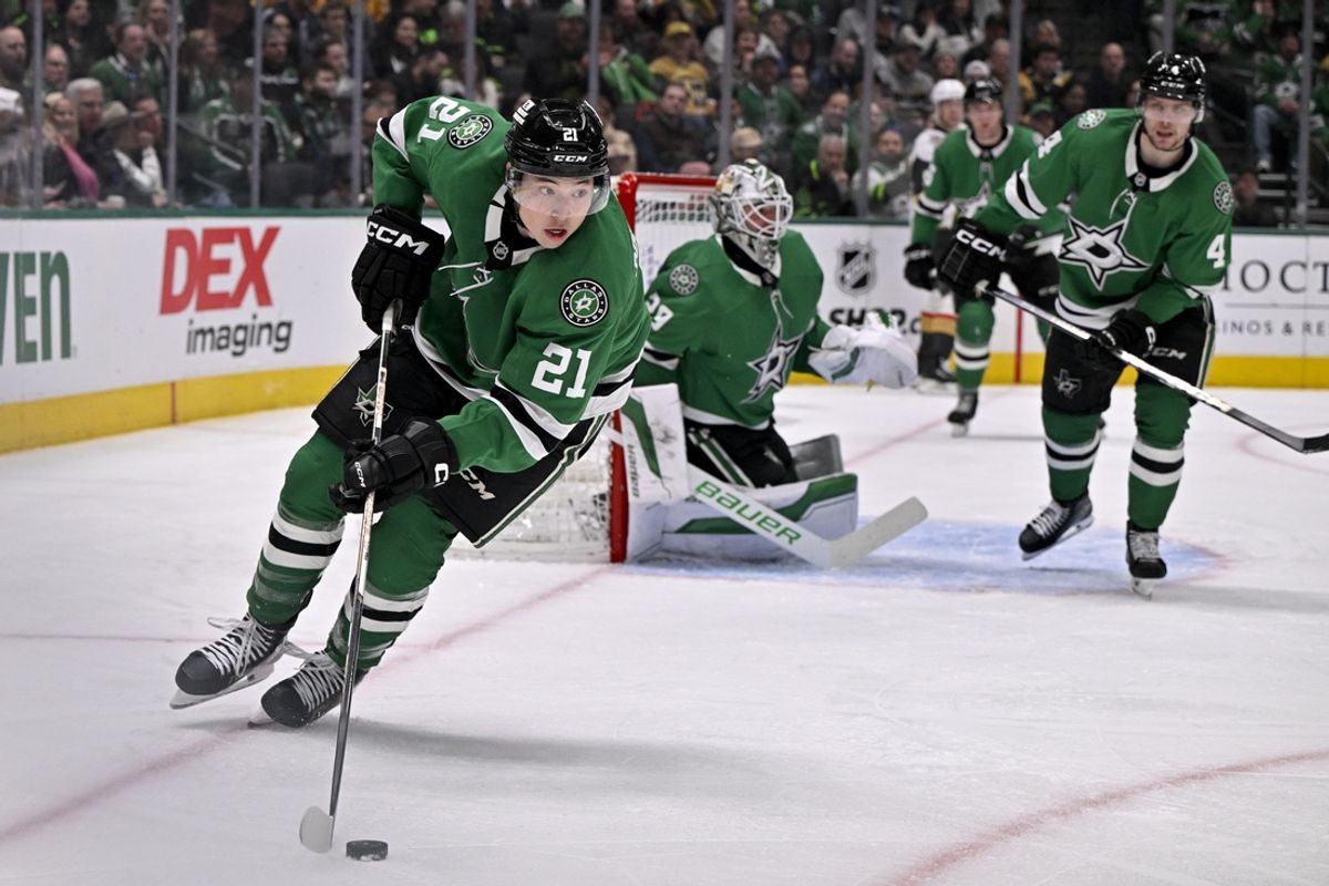 Jan 24, 2025; Dallas, Texas, USA; Dallas Stars left wing Jason Robertson (21) brings the puck out of the Dallas zone during the third period against the Vegas Golden Knights at the American Airlines Center. Mandatory Credit: Jerome Miron-Imagn Images