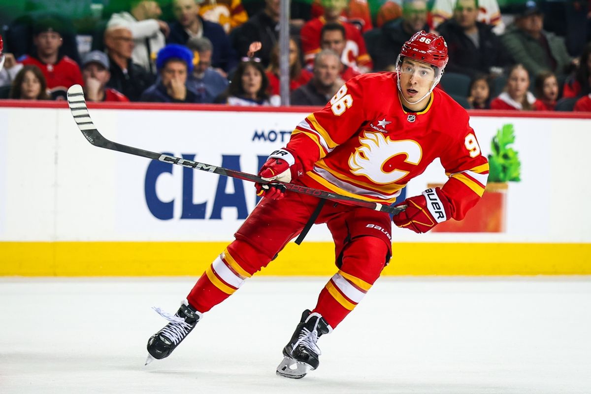 Jan 23, 2025; Calgary, Alberta, CAN; Calgary Flames left wing Andrei Kuzmenko (96) skates against the Buffalo Sabres during the first period at Scotiabank Saddledome. Mandatory Credit: Sergei Belski-Imagn Images