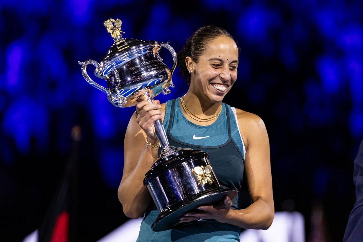 Jan 25, 2025; Melbourne, Victoria, Australia; Madison Keys of United States of America receives her trophy during the prize presentation of the women's single at the 2025 Australian Open at Melbourne Park. Mandatory Credit: Mike Frey-Imagn Images