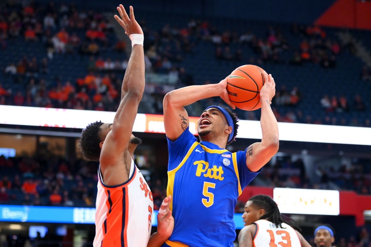 Jan 25, 2025; Syracuse, New York, USA; Pittsburgh Panthers guard Ishmael Leggett (5) shoots against Syracuse Orange guard J.J. Starling (2) during the first half at the JMA Wireless Dome. Mandatory Credit: Rich Barnes-Imagn Images