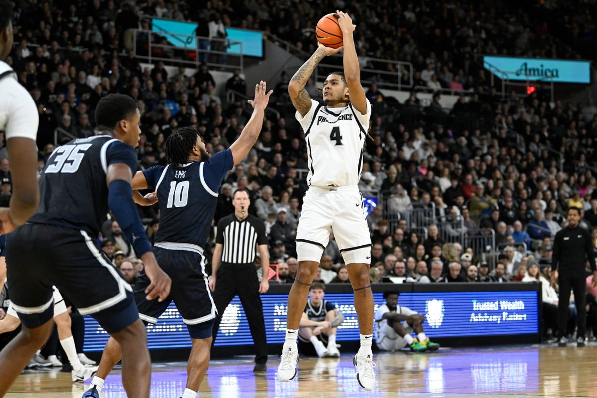 Jan 25, 2025; Providence, Rhode Island, USA; Providence Friars guard Justyn Fernandez (4) shoots over Georgetown Hoyas guard Jayden Epps (10) during the first half at Amica Mutual Pavilion. Mandatory Credit: Eric Canha-Imagn Images