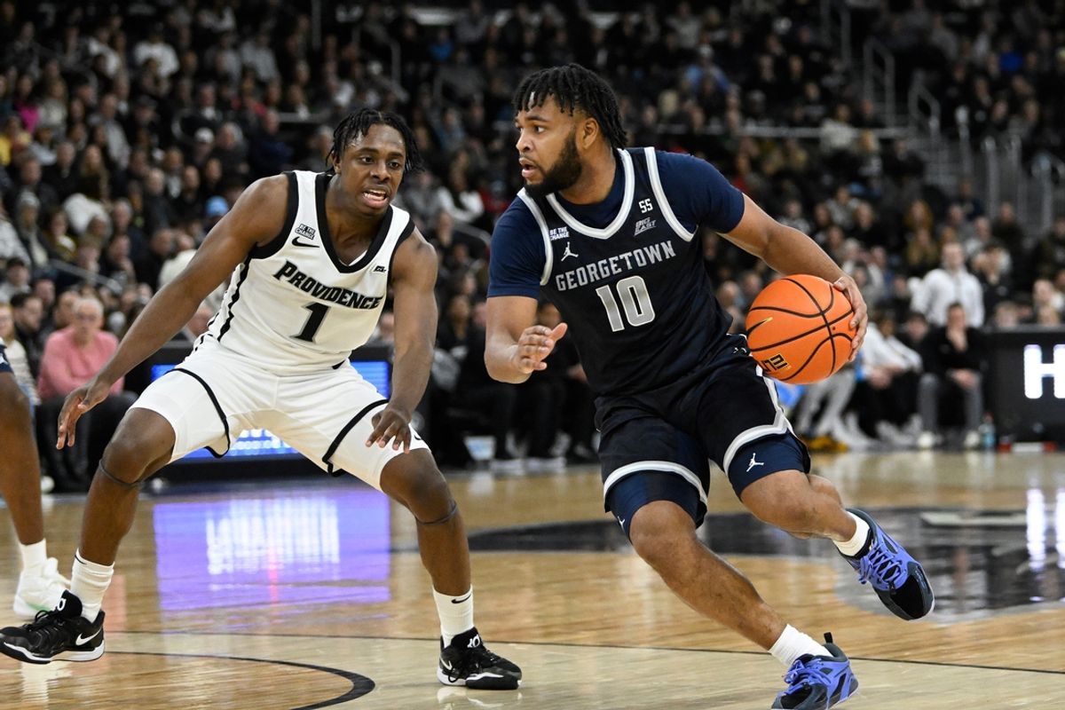 Jan 25, 2025; Providence, Rhode Island, USA; Georgetown Hoyas guard Jayden Epps (10) dribbles the ball against Providence Friars guard Jayden Pierre (1) during the second half at Amica Mutual Pavilion. Mandatory Credit: Eric Canha-Imagn Images