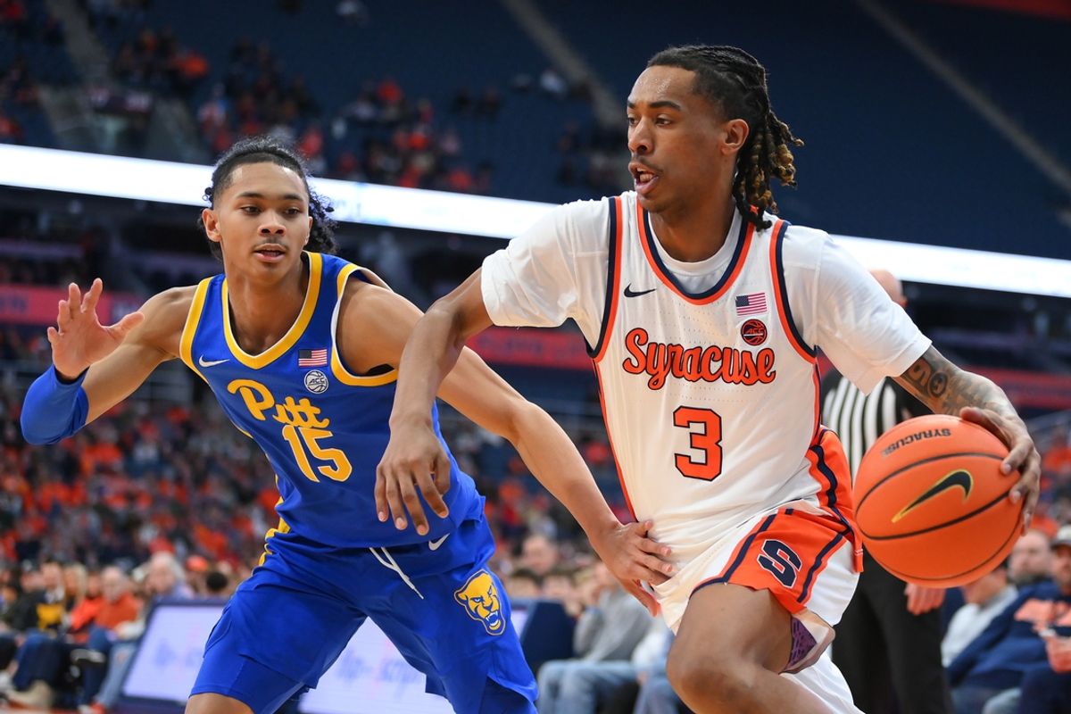 Jan 25, 2025; Syracuse, New York, USA; Syracuse Orange guard Lucas Taylor (3) drives against Pittsburgh Panthers guard Jaland Lowe (15) during the second half at the JMA Wireless Dome. Mandatory Credit: Rich Barnes-Imagn Images