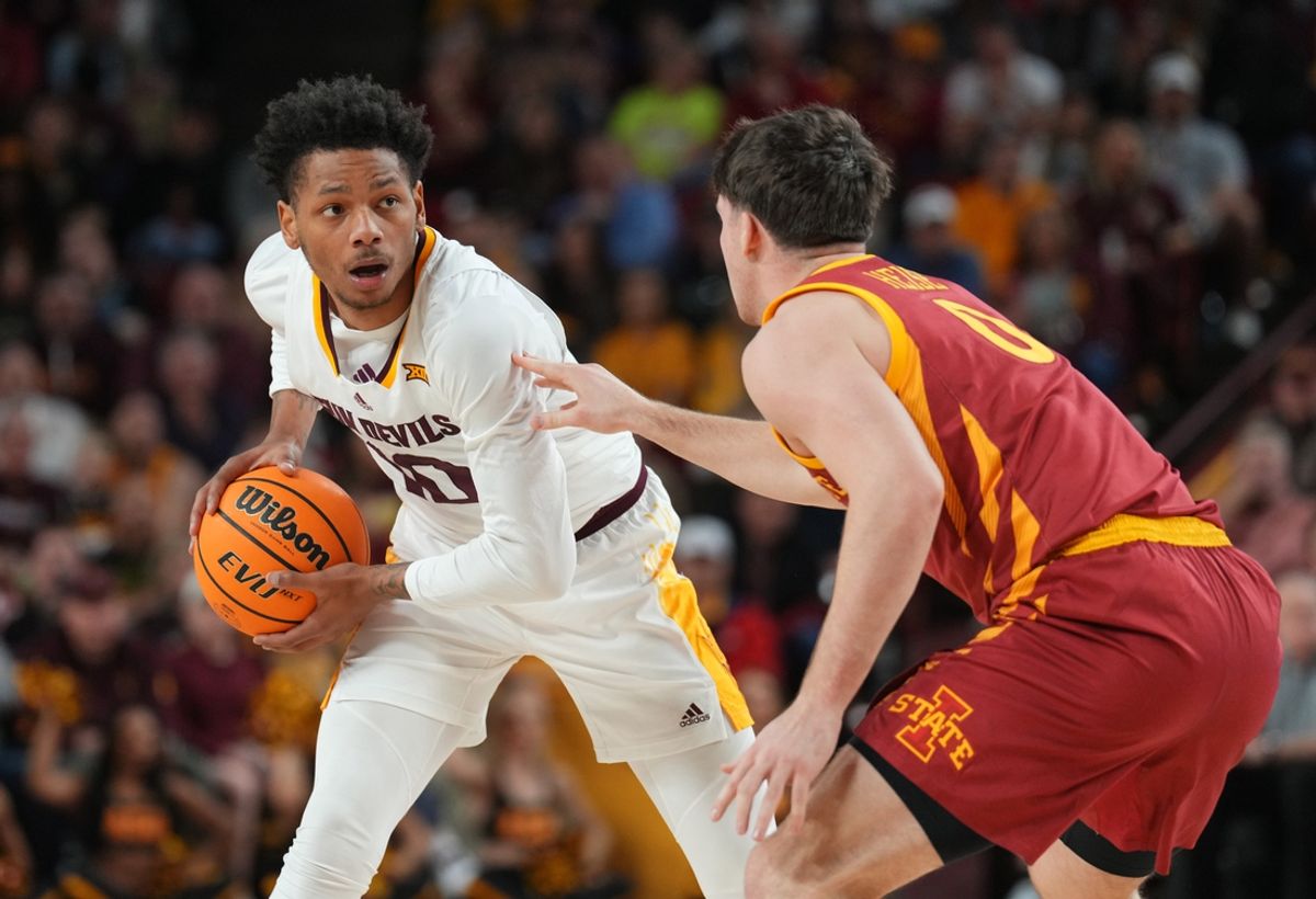 Jan 25, 2025; Tempe, Arizona, USA; Iowa State Cyclones guard Nate Heise (0) guards Arizona State Sun Devils guard BJ Freeman (10) during the first half at Desert Financial Arena. Mandatory Credit: Joe Camporeale-Imagn Images