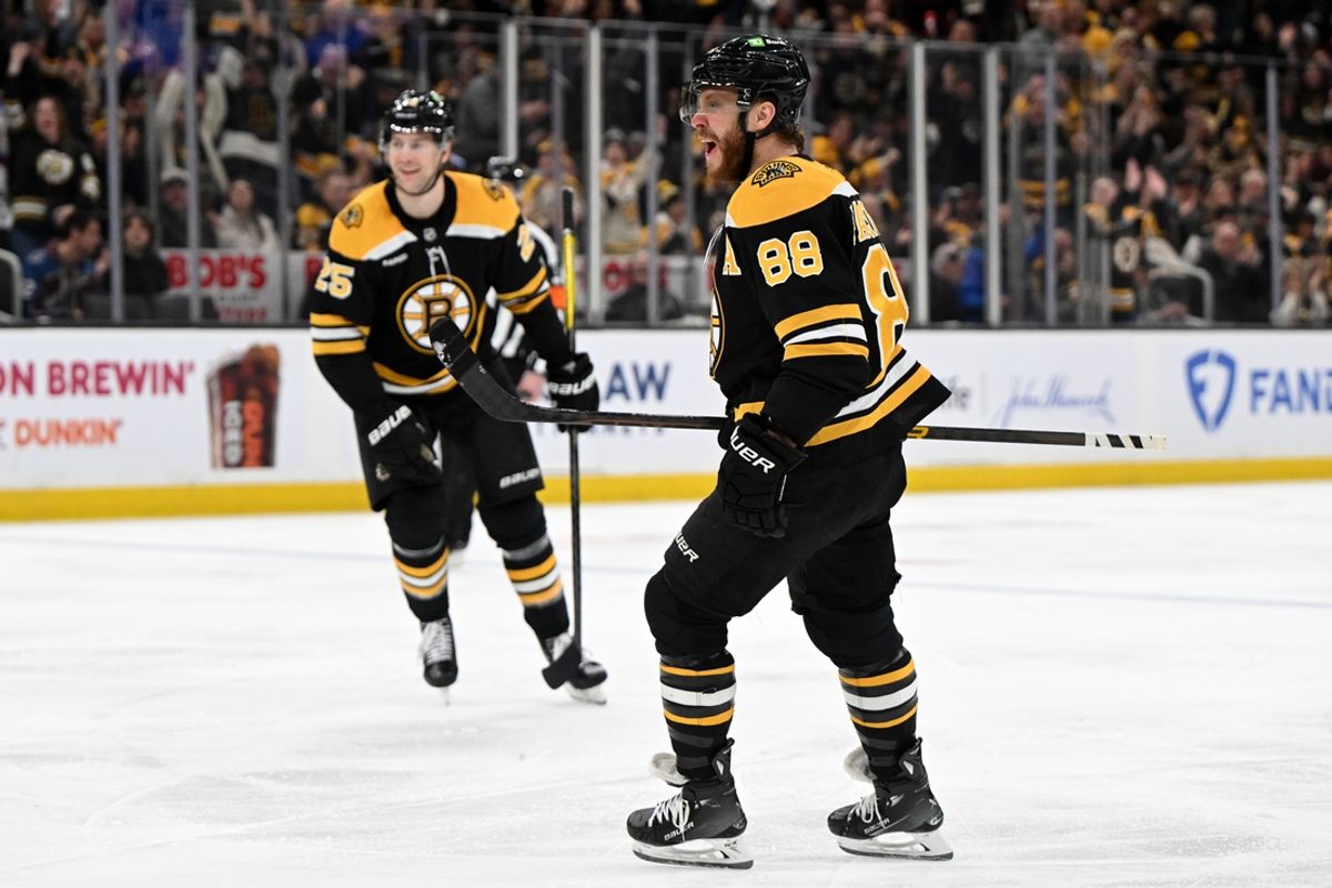 Jan 25, 2025; Boston, Massachusetts, USA; Boston Bruins right wing David Pastrnak (88) reacts after an assist on a goal against the Colorado Avalanche during the third period at the TD Garden. Mandatory Credit: Brian Fluharty-Imagn Images