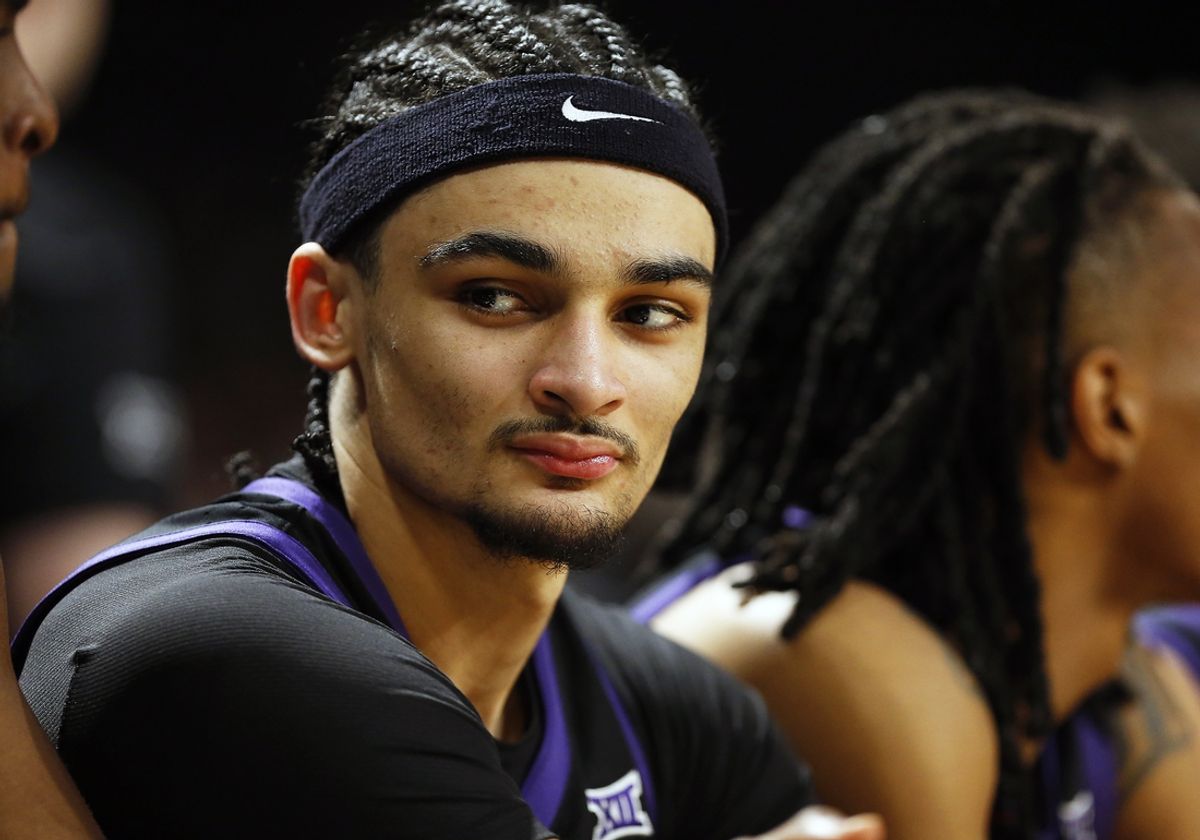 Jan 25, 2025; Orlando, Florida, USA; Texas Christian Horned Frogs forward David Punch (15) sits on the bunch in a game against the Central Florida Knights at Addition Financial Arena. Mandatory Credit: Russell Lansford-Imagn Images