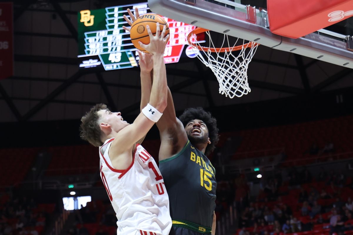 Jan 25, 2025; Salt Lake City, Utah, USA; Baylor Bears forward Norchad Omier (15) blocks the shot of Utah Utes forward Jake Wahlin (10) during the second half at Jon M. Huntsman Center. Mandatory Credit: Rob Gray-Imagn Images
