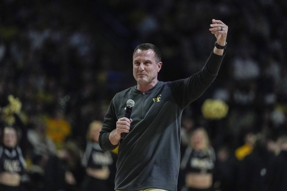 Jan 25, 2025; Winston-Salem, North Carolina, USA; New Wake Forest Demon Deacons football coach Jake Dickert speaks to the fans during the first half between the Wake Forest Demon Deacons and the Duke Blue Devils at Lawrence Joel Veterans Memorial Coliseum. Mandatory Credit: Jim Dedmon-Imagn Images