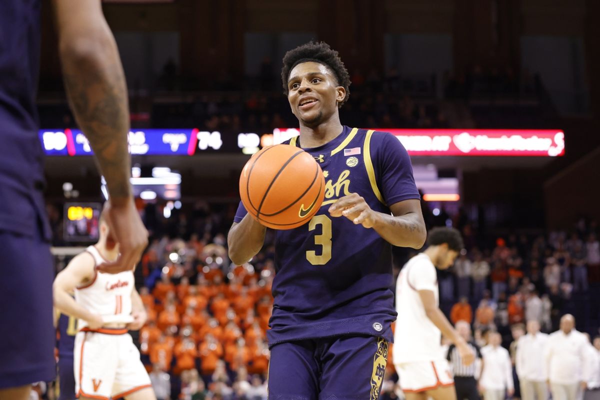Jan 25, 2025; Charlottesville, Virginia, USA; Notre Dame Fighting Irish guard Markus Burton (3) celebrates on the court during the final seconds in the second half against the Virginia Cavaliers at John Paul Jones Arena. Mandatory Credit: Amber Searls-Imagn Images