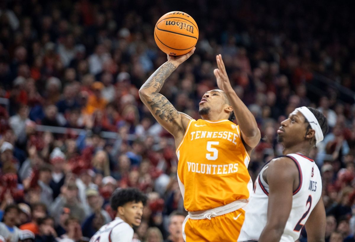 Tennessee Volunteers guard Zakai Zeigler (5) draws a foul on Auburn Tigers guard Denver Jones (2) as Auburn Tigers take on Tennessee Volunteers at Neville Arena in Auburn, Ala., on Saturday, Jan. 25, 2025.