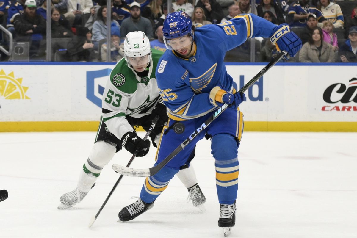 Jan 25, 2025; St. Louis, Missouri, USA; Dallas Stars center Wyatt Johnston (53) pressures St. Louis Blues center Jordan Kyrou (25) during the second period at Enterprise Center. Mandatory Credit: Jeff Le-Imagn Images