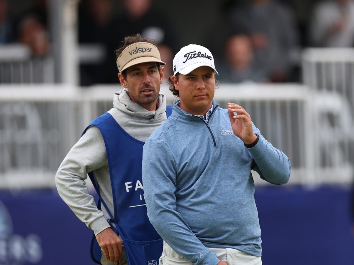 Jan 25, 2025; San Diego, California, USA; Aldrich Potgieter talks with his caddie on the 18th hole during the final round of the Farmers Insurance Open golf tournament at Torrey Pines Municipal Golf Course - South Course. Mandatory Credit: Abe Arredondo-Imagn Images