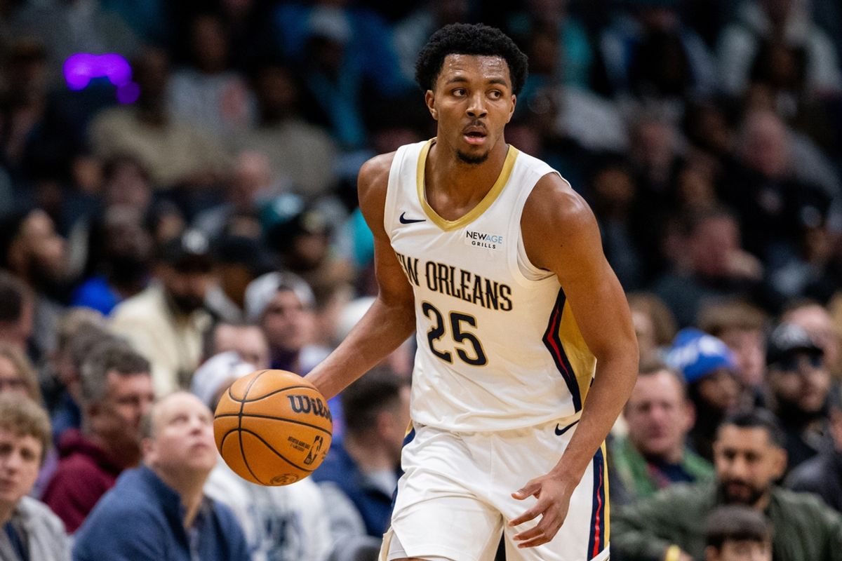 Jan 25, 2025; Charlotte, North Carolina, USA; New Orleans Pelicans guard Trey Murphy III (25) brings the ball up court against the Charlotte Hornets during the third quarter at Spectrum Center. Mandatory Credit: Scott Kinser-Imagn Images