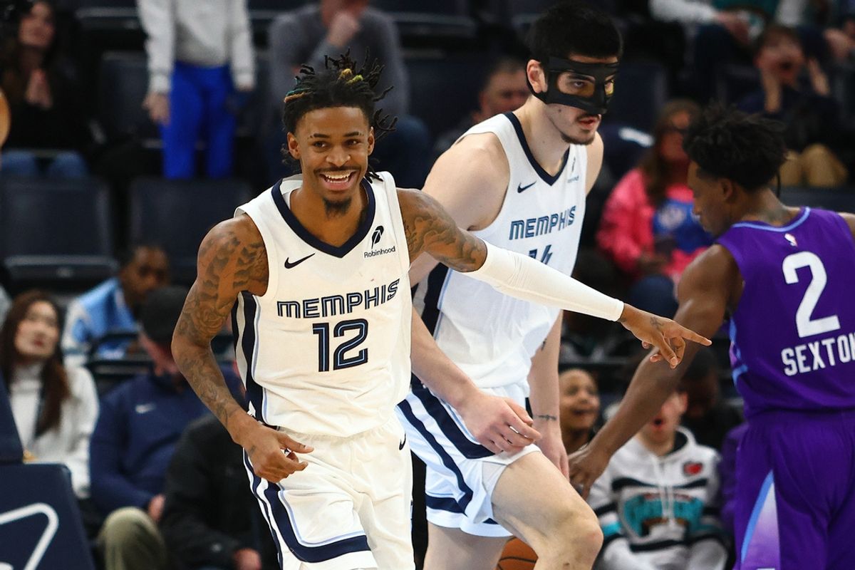 Jan 25, 2025; Memphis, Tennessee, USA; Memphis Grizzlies guard Ja Morant (12) reacts during the fourth quarter against the Utah Jazz at FedExForum. Mandatory Credit: Petre Thomas-Imagn Images