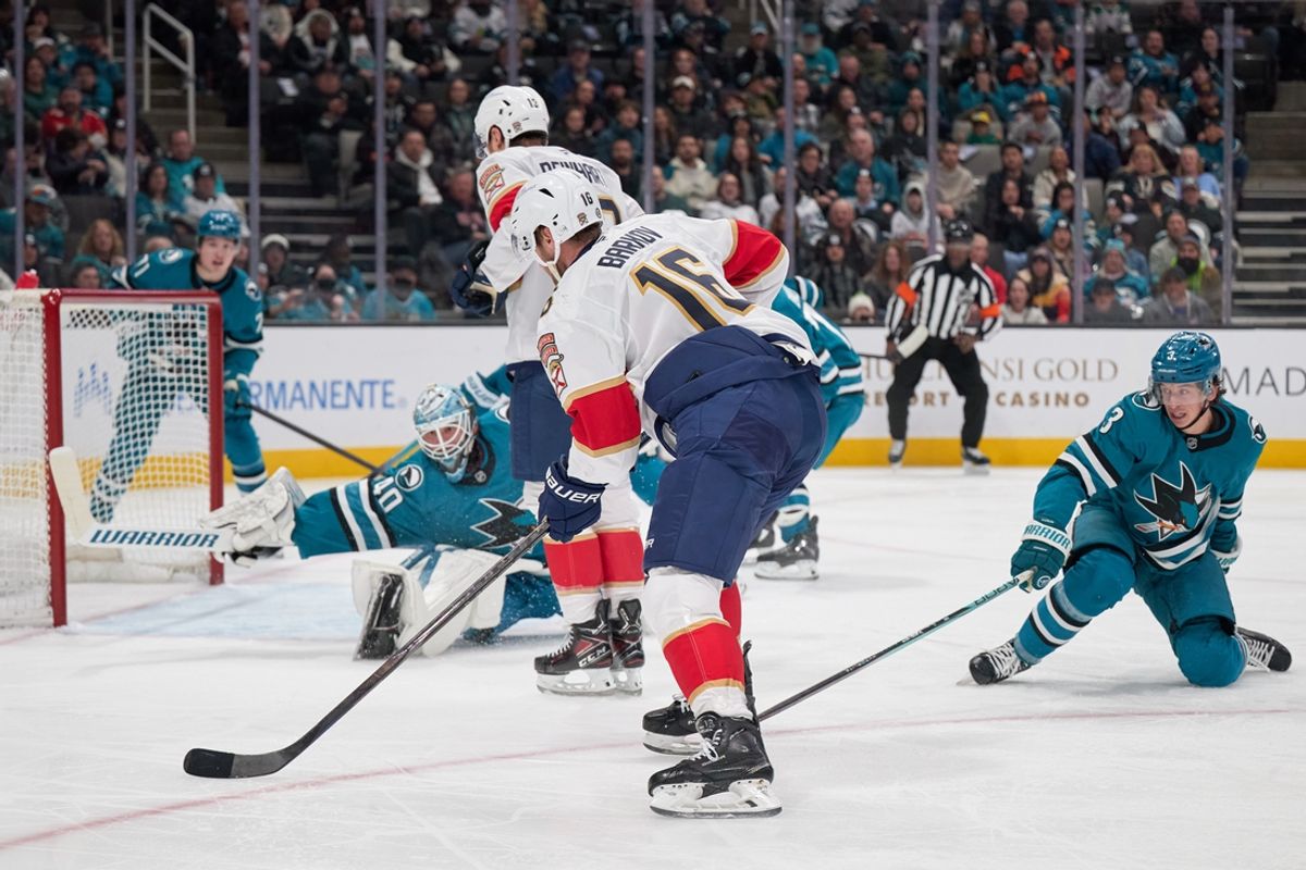 Jan 25, 2025; San Jose, California, USA; San Florida Panthers center Aleksander Barkov (16) shoots the puck against San Jose Sharks goaltender Alexandar Georgiev (40) and defenseman Henry Thrun (3) during the first period at SAP Center at San Jose. Mandatory Credit: Robert Edwards-Imagn Images
