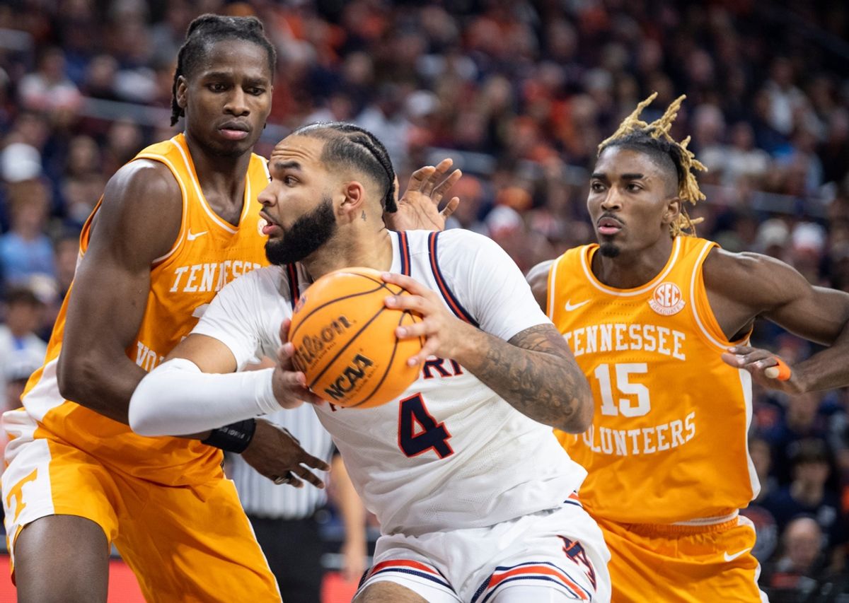 Auburn Tigers forward Johni Broome (4) makes a post move as Auburn Tigers take on Tennessee Volunteers at Neville Arena in Auburn, Ala., on Saturday, Jan. 25, 2025. Auburn Tigers defeated Tennessee Volunteers 53-51.
