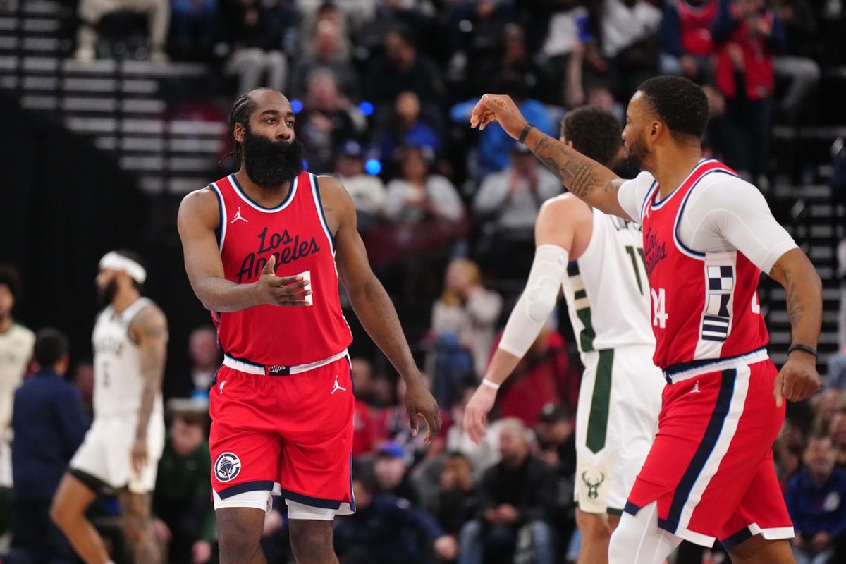 Jan 25, 2025; Inglewood, California, USA; LA Clippers guard James Harden (1) and guard Norman Powell (24) celebrate in the second half against the Milwaukee Bucks at Intuit Dome. Mandatory Credit: Kirby Lee-Imagn Images