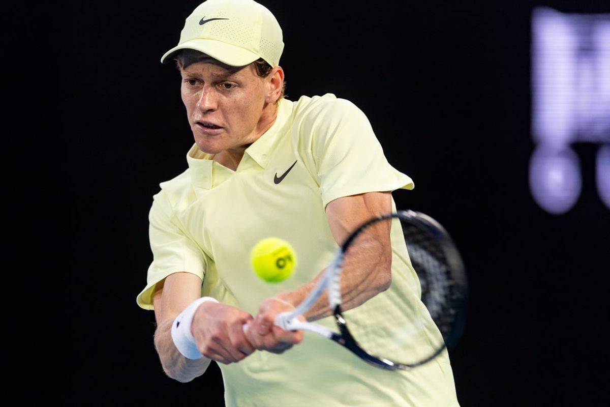 Jan 26, 2025; Melbourne, Victoria, Australia; Jannik Sinner of Italy plays a backhand during his match against Alexander Zverev of Germany in the final of the men's singles at the 2025 Australian Open at Melbourne Park. Mandatory Credit: Mike Frey-Imagn Images