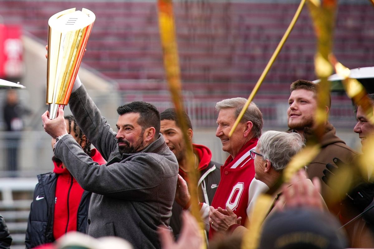 Ohio State Buckeyes head coach Ryan Day raises the trophy during Ohio State's national championship celebration at Ohio Stadium on Sunday, Jan. 26, 2025 in Columbus, Ohio.