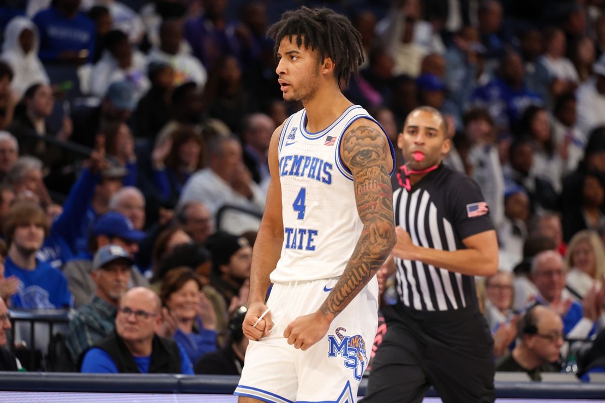 Jan 26, 2025; Memphis, Tennessee, USA; Memphis Tigers guard PJ Haggerty (4) reacts against the UAB Blazers during the second half at FedExForum. Mandatory Credit: Wesley Hale-Imagn Images