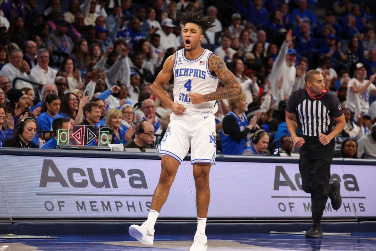 Jan 26, 2025; Memphis, Tennessee, USA; Memphis Tigers guard PJ Haggerty (4) reacts after a three point basket against the UAB Blazers during the second half at FedExForum. Mandatory Credit: Wesley Hale-Imagn Images