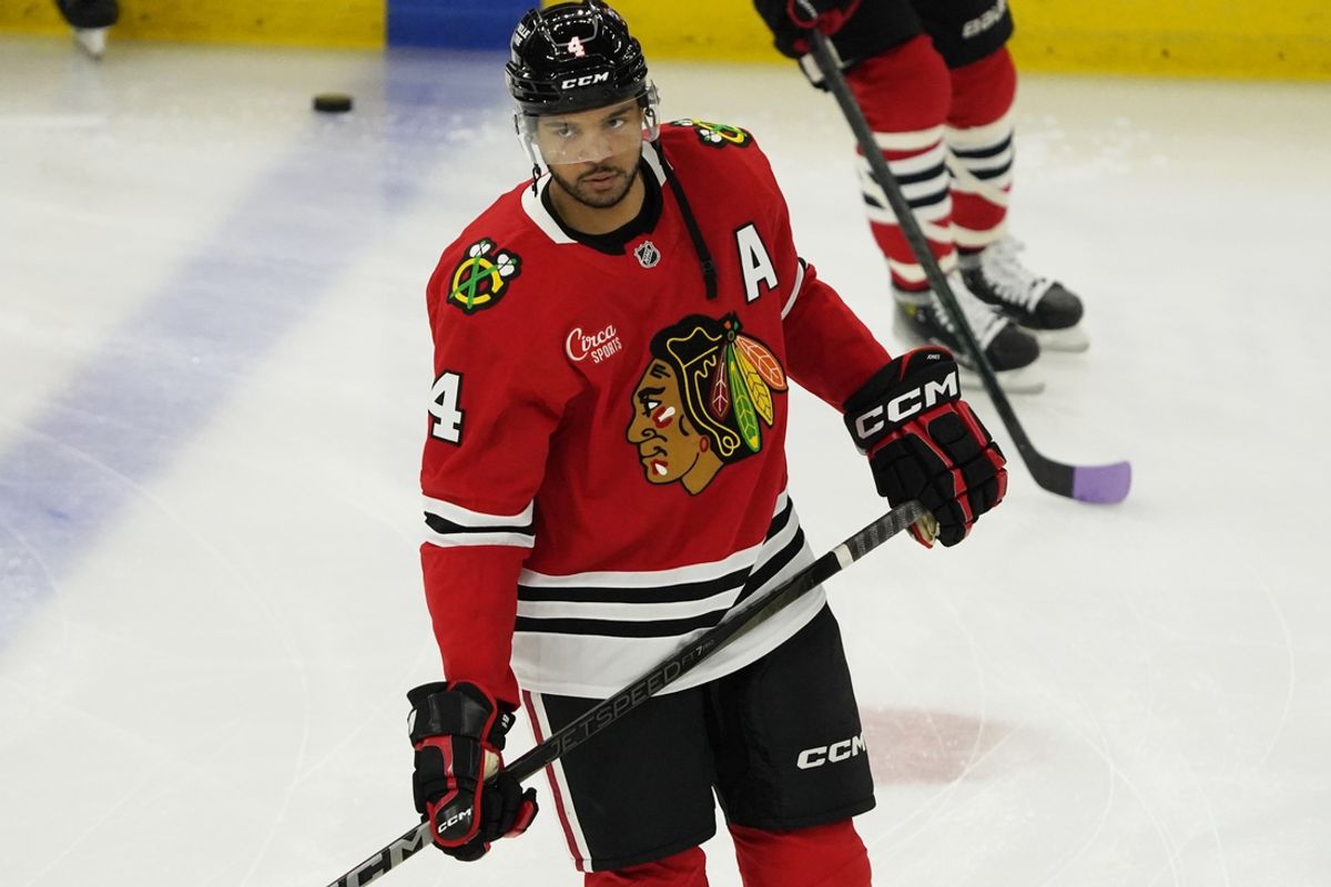Jan 26, 2025; Chicago, Illinois, USA; Chicago Blackhawks defenseman Seth Jones (4) warms up before a game against the Minnesota Wild at United Center. Mandatory Credit: David Banks-Imagn Images