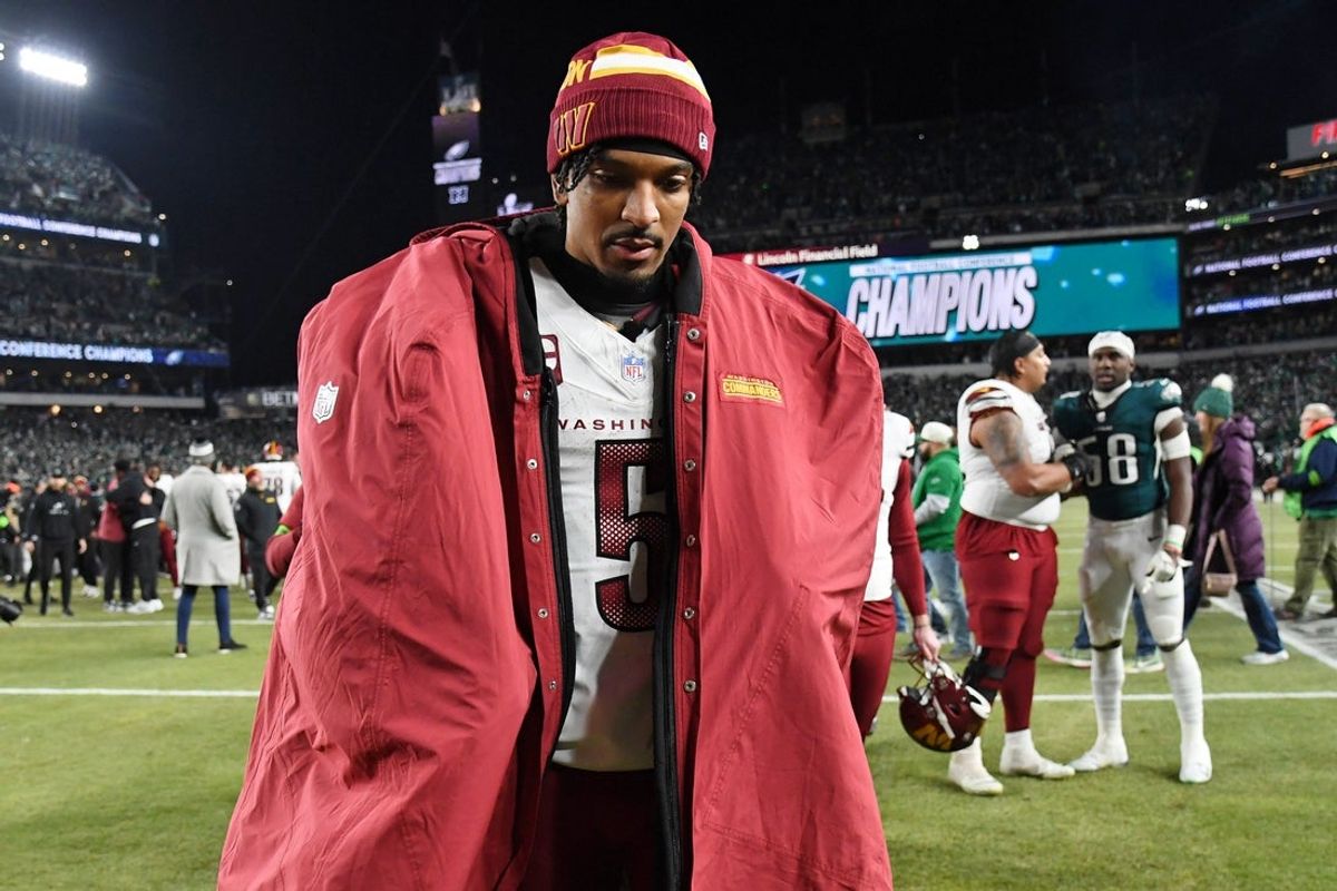 Jan 26, 2025; Philadelphia, PA, USA; Washington Commanders quarterback Jayden Daniels (5) walks off the field after losing the NFC Championship game against the Philadelphia Eagles at Lincoln Financial Field. Mandatory Credit: Eric Hartline-Imagn Images