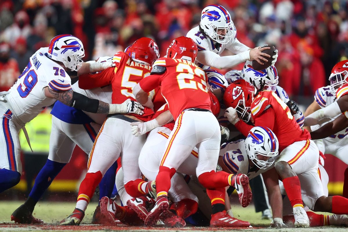 Jan 26, 2025; Kansas City, MO, USA; Buffalo Bills quarterback Josh Allen (17) dives for a first down against the Kansas City Chiefs during the second half in the AFC Championship game at GEHA Field at Arrowhead Stadium. Mandatory Credit: Mark J. Rebilas-Imagn Images