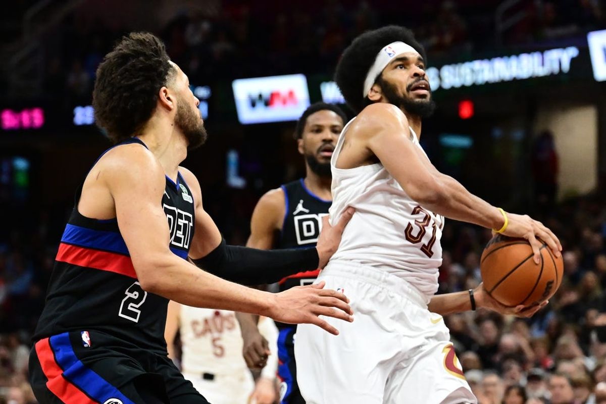 Jan 27, 2025; Cleveland, Ohio, USA; Cleveland Cavaliers center Jarrett Allen (31) drives to the basket against Detroit Pistons guard Cade Cunningham (2) during the second half at Rocket Mortgage FieldHouse. Mandatory Credit: Ken Blaze-Imagn Images