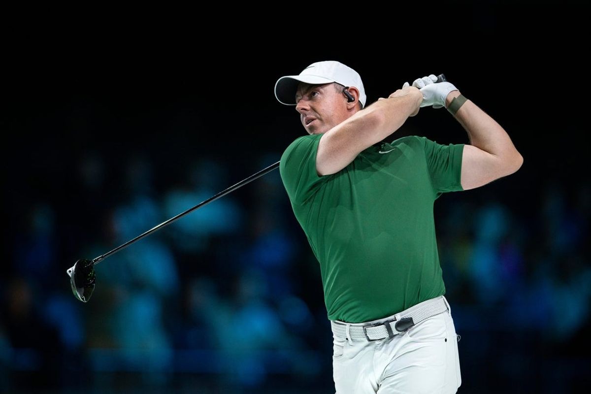 Rory McIlroy of Boston Common tees off during TGL match against Jupiter Links GC at the SoFi Center on January 27, 2025, in Palm Beach Gardens, Florida.