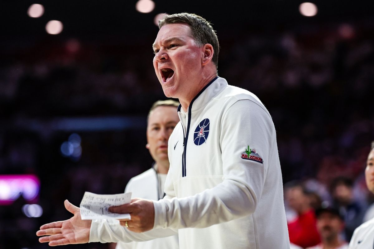 Jan 27, 2025; Tucson, Arizona, USA; Arizona Wildcats head coach Tommy Lloyd yells toward a referee after a call was made during the first half against Iowa State at McKale Center. Mandatory Credit: Aryanna Frank-Imagn Images