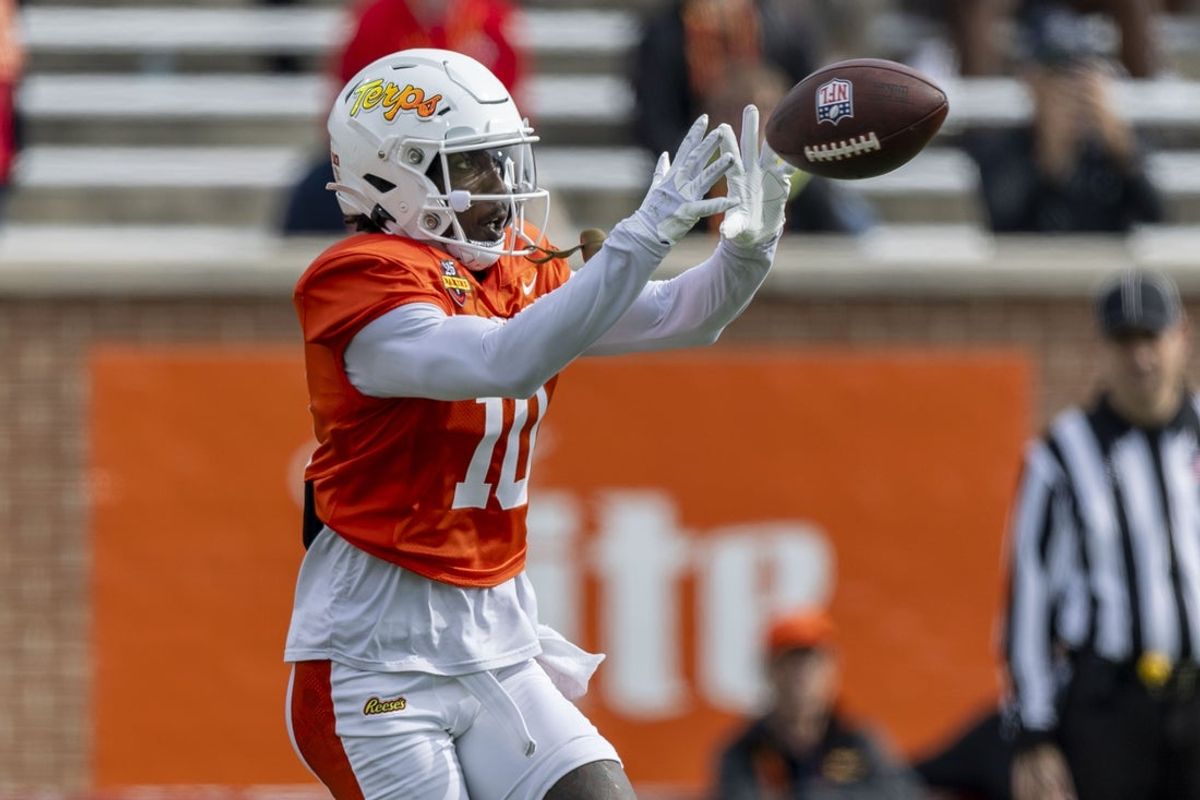 Jan 28, 2025; Mobile, AL, USA; American team wide receiver Tai Felton of Maryland (10) grabs a pass during Senior Bowl practice for the American team at Hancock Whitney Stadium. Mandatory Credit: Vasha Hunt-Imagn Images