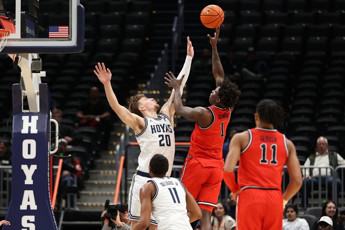 Jan 28, 2025; Washington, District of Columbia, USA;  St. John's Red Storm guard Kadary Richmond (1) takes a shot over Georgetown Hoyas forward Drew Fielder (20) during the first half at Capital One Arena. Mandatory Credit: Daniel Kucin Jr.-Imagn Images