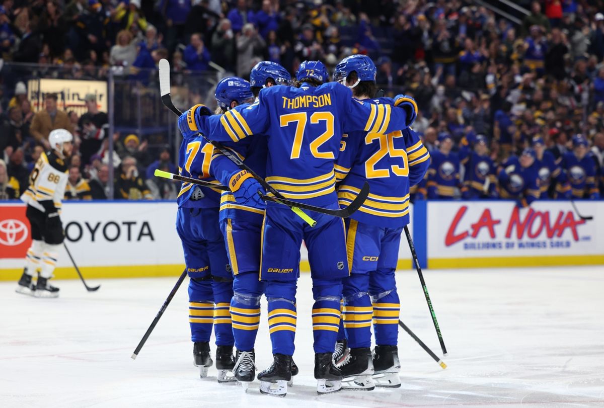 Jan 28, 2025; Buffalo, New York, USA;  Buffalo Sabres center Tage Thompson (72) celebrates his goal with teammates during the second period against the Boston Bruins at KeyBank Center. Mandatory Credit: Timothy T. Ludwig-Imagn Images