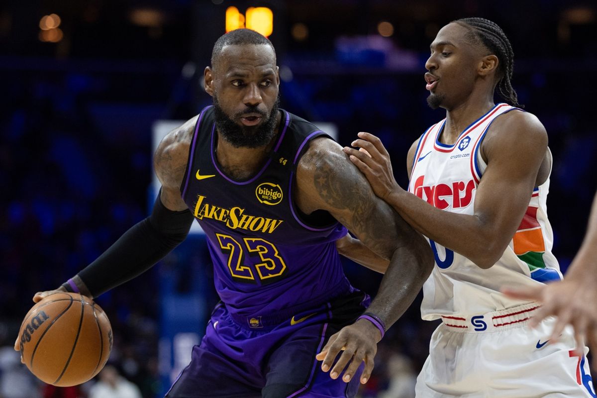 Jan 28, 2025; Philadelphia, Pennsylvania, USA; Los Angeles Lakers forward LeBron James (23) controls the ball against Philadelphia 76ers guard Tyrese Maxey (0) during the second quarter at Wells Fargo Center. Mandatory Credit: Bill Streicher-Imagn Images