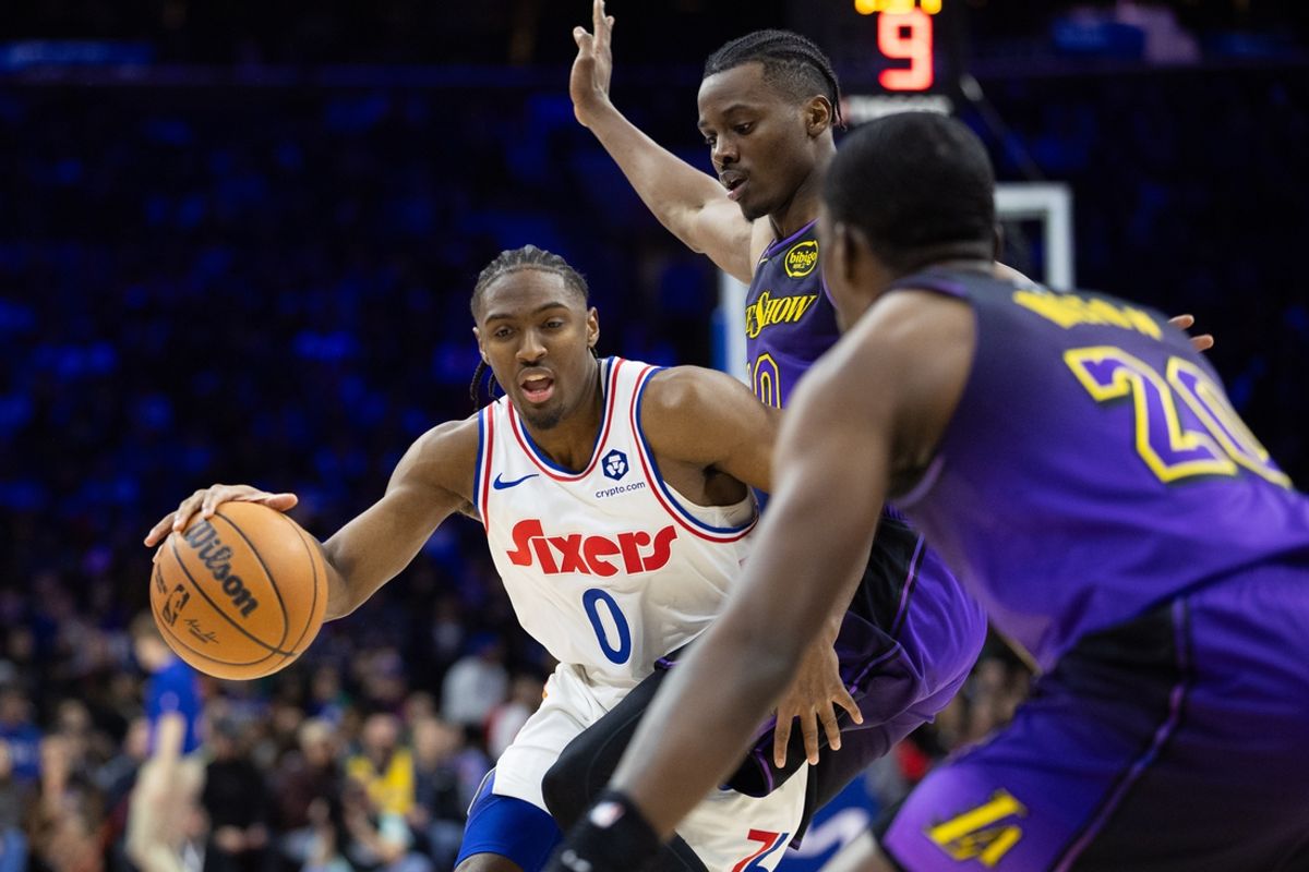 Jan 28, 2025; Philadelphia, Pennsylvania, USA; Philadelphia 76ers guard Tyrese Maxey (0) dribbles the ball against the Los Angeles Lakers during the fourth quarter at Wells Fargo Center. Mandatory Credit: Bill Streicher-Imagn Images