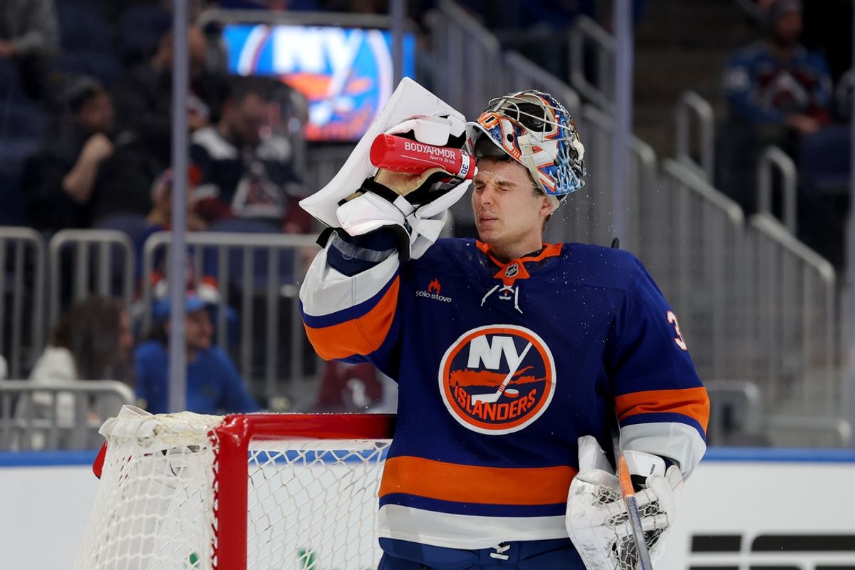 Jan 28, 2025; Elmont, New York, USA; New York Islanders goaltender Ilya Sorokin (30) sprays water on his face during the third period against the Colorado Avalanche at UBS Arena. Mandatory Credit: Brad Penner-Imagn Images