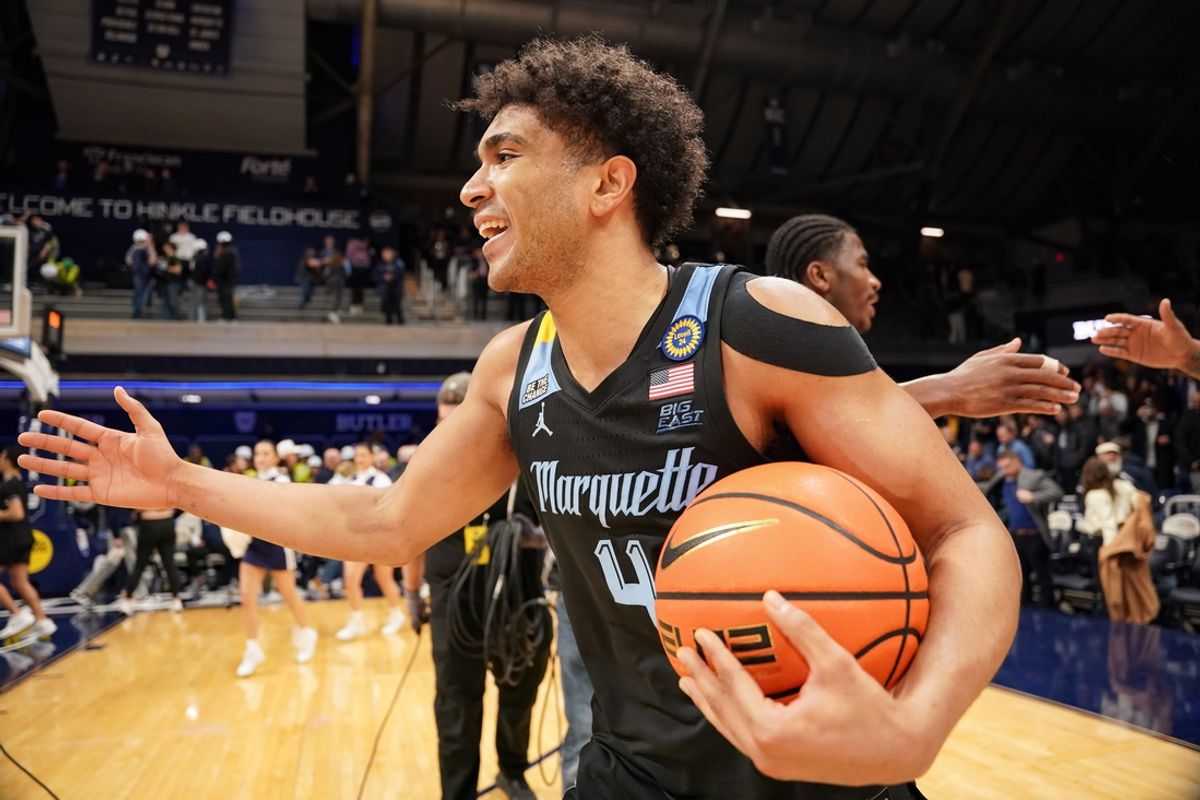 Jan 28, 2025; Indianapolis, Indiana, USA; Marquette Golden Eagles guard Stevie Mitchell (4) celebrates after defeating the Butler Bulldogs at Hinkle Fieldhouse. Mandatory Credit: Robert Goddin-Imagn Images