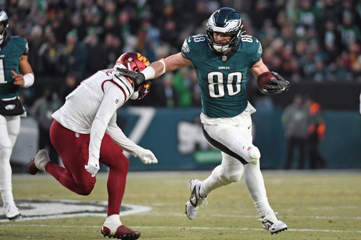 Jan 26, 2025; Philadelphia, PA, USA; Philadelphia Eagles tight end Dallas Goedert (88) tries to get past Washington Commanders cornerback Mike Sainristil (0) in the NFC Championship game at Lincoln Financial Field. Mandatory Credit: Eric Hartline-Imagn Images