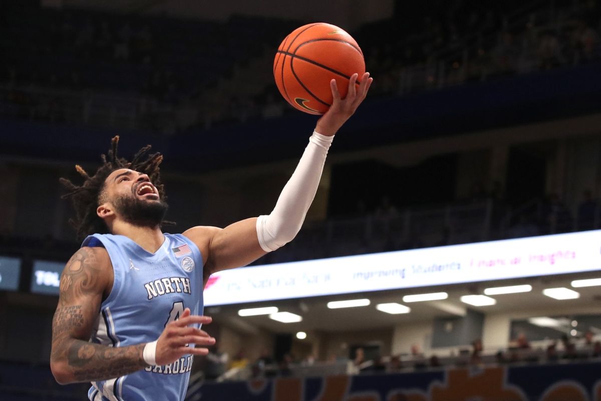 Jan 28, 2025; Pittsburgh, Pennsylvania, USA;  North Carolina Tar Heels guard RJ Davis (4) goes to the basket against the Pittsburgh Panthers during the second half at the Petersen Events Center. Mandatory Credit: Charles LeClaire-Imagn Images