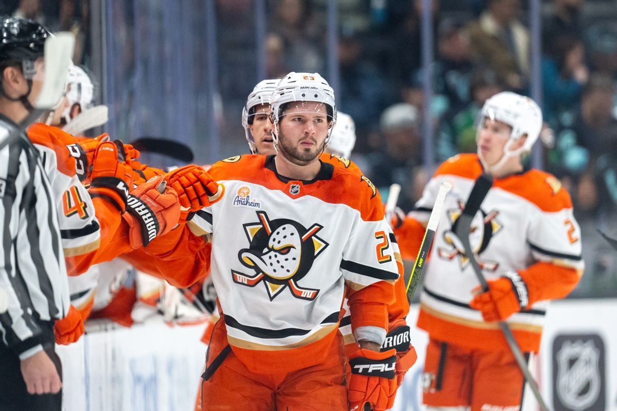 Jan 28, 2025; Seattle, Washington, USA;  Anaheim Ducks forward Mason McTavish (23) is congratulated by teammates on the bench after scoring a goal during the second period against the Seattle Kraken at Climate Pledge Arena. Mandatory Credit: Stephen Brashear-Imagn Images