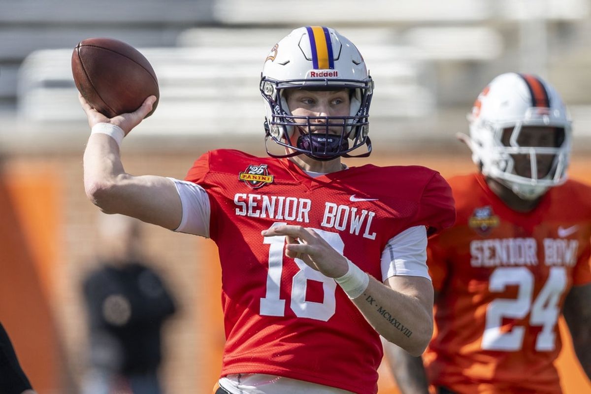 Jan 29, 2025; Mobile, AL, USA; National team quarterback Taylor Elgersma of Laurier (18) throws the ball during Senior Bowl practice for the National team at Hancock Whitney Stadium. Mandatory Credit: Vasha Hunt-Imagn Images