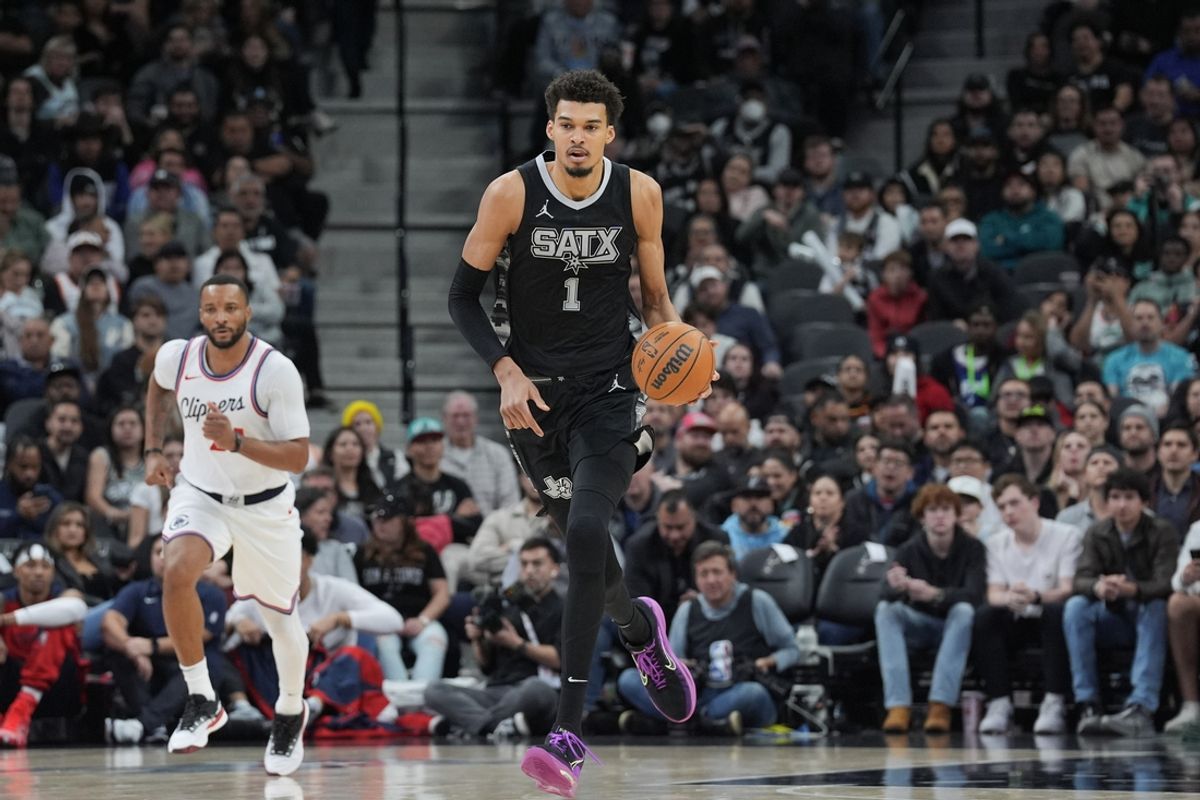 Jan 29, 2025; San Antonio, Texas, USA;  San Antonio Spurs center Victor Wembanyama (1) dribbles the ball up in the second half against the LA Clippers at Frost Bank Center. Mandatory Credit: Daniel Dunn-Imagn Images